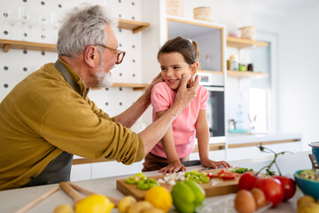 Family, generation love and people concept. Happy grandparent having fun with children at home