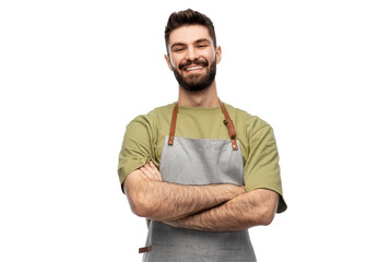 people, profession and job concept - happy smiling barman in apron with crossed arms over white background