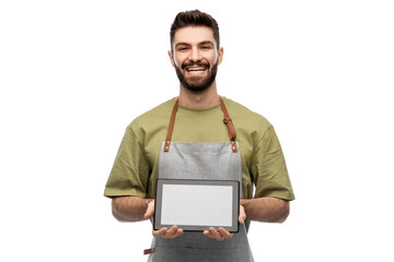 people, profession and job concept - happy smiling waiter or seller in apron showing tablet pc computer over white background