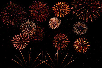 Colorful fireworks festivals on black background.