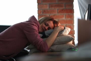 Woman sllep on office table closeup background