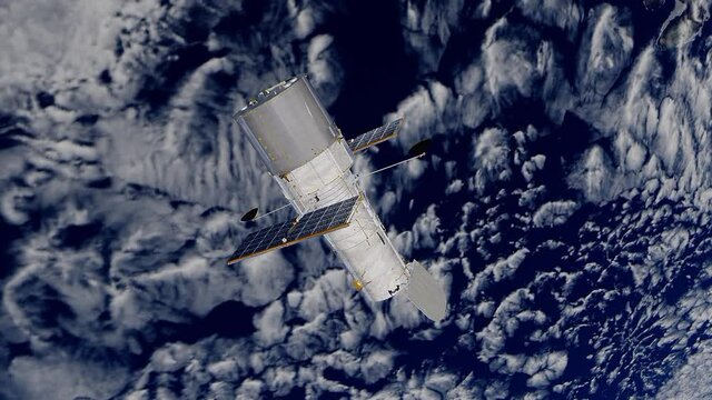 Hubble Telescope moving above the Earth with clouds below.