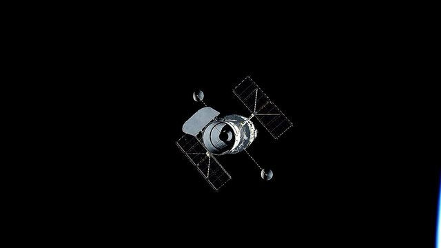 Moving towards the Hubble Telescope above Earth in operation.