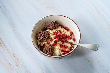 Obraz na płótnie Canvas Amaranth Chocolate and Granola with Yogurt, Honey, Pomegranate Seeds. Yoghurt.