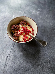 Amaranth Chocolate and Granola with Yogurt, Honey, Pomegranate Seeds. Yoghurt.