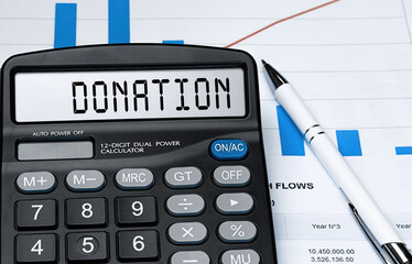 Calculator with the word DONATION on the display
