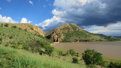 Fototapeta na wymiar Dramatic clouds over Olifantsnek Dam near Rustenburg, North West , South Africa