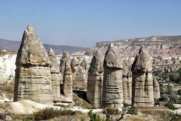 Unusually shaped cliffs of volcanic origin in the Love Valley in the Cappadocia region in Turkey.