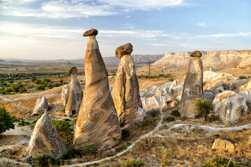 Unusually shaped cliffs of volcanic origin in the Pashabag Valley in the Cappadocia region in Turkey.