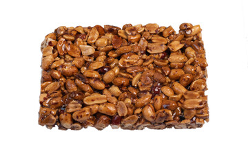 Homemade kozinaki made from peanuts on white background