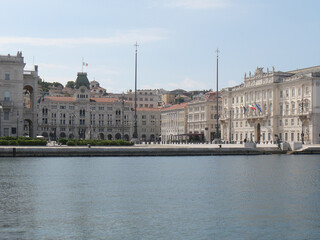 Fototapeta na wymiar Piazza Unità d'Italia in Trieste, panorama from Molo Audace of its buildings like Palace of Lloyd, Palace of the Austrian Lieutenancy and Town