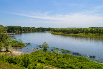 Naklejka na ściany i meble Shore of the Don river in the environs of Rostov-on-Don, Rostov region. Summer landscape in Veshenskaya village