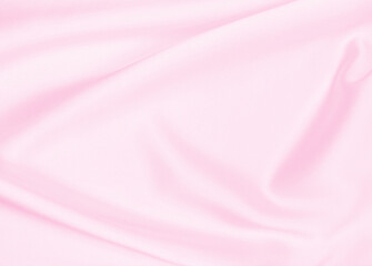 Smooth elegant pink silk or satin texture as wedding background. Luxurious background design