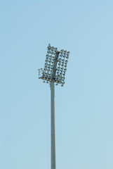 A Stadium light pole in the sky.