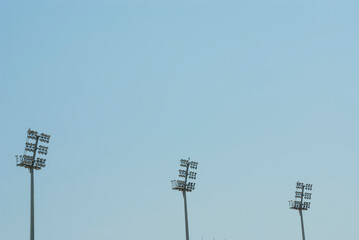 A Stadium light pole in the sky.