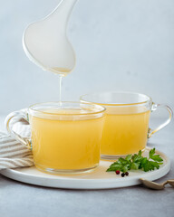 bone broth in a glass