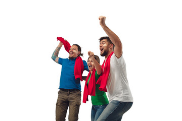 Excellent goal. Three soccer fans woman and men cheering for favourite sport team with bright emotions isolated on white studio background. Looking excited, supporting. Concept of sport, fun, support.