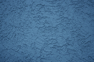 The wall is made of plaster. Rough surface. Solid color abstract background.