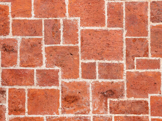 orange clay brick blocks abstract background a vintage brown texture of brick wall surface for house decoration or pathway floor in garden