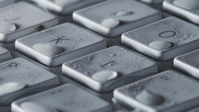 Time lapse of defrosting computer keyboard. Macro detail