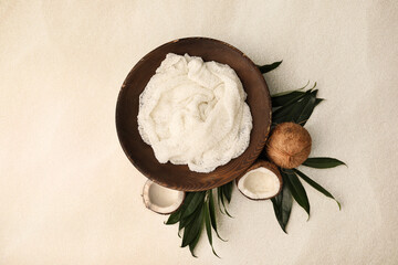 Newborn photography digital background prop. Wooden bowl with coconuts and tropical leaves on white...