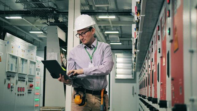 Electrical engineer working at a power station