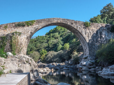 Gorge of the Alardos river in Madrigal de la Vera, Caceres. Stone arched bridge in Extremadura, Spain