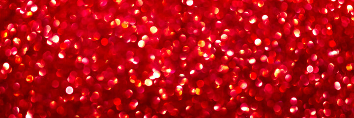 Abstract red light bokeh background for Xmas, Valentine, New Year, Easter or special event . Banner.