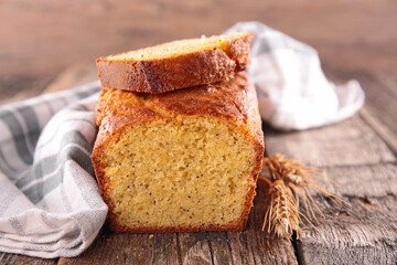lemon loaf cake on wood background