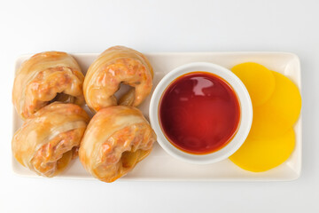 Kimchi dumplings on white background