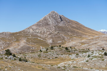 barren slopes and Camicia peak, near Capo la Serra pass, Abruzzo, Italy