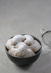 Putri Salju or Snow White Cookies. made of fine cashews, butter a little flour and sugat,after being cooked it is sown with refined sugar. Usually served during Idul Fitri or Christmas