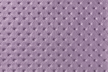 Texture of purple leather background with capitone pattern, macro.