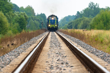 On the tracks, an approaching train to cross