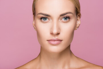 Fototapeta premium beautiful blonde woman with perfect skin isolated on pink