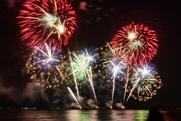 Colorful of fireworks In the sea display on sky background