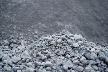The sand and gravel material is gray in color