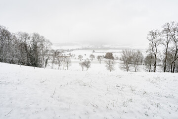 Winter hike in snow from Wilhelmsdorf on the Hoechsten on Lake Constance