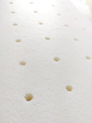 Production of mattresses for beds. Clothing industry. Filler for mattress. Texture of latex material
