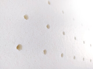 Production of mattresses for beds. Clothing industry. Filler for mattress. Texture of latex material