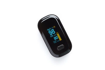 Pulse oximeter on white background. In measure blood oxygen saturation and pulse.
