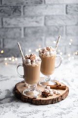 Still life cup of hot chocolate with marshmallows. Christmas. New Year. A festive hot drink. Mug of cappuccino. Sweet dessert.