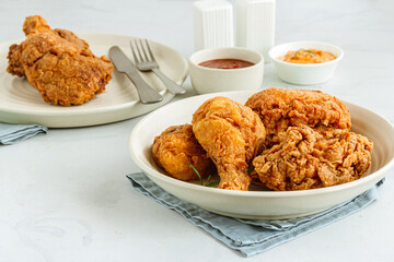 Fried Chicken in a Bowl  with Condiments Low Angle Horizontal Photography