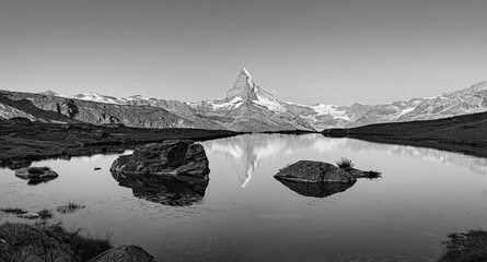 Bernese range above Bachalpsee lake. Peaks Eiger, Jungfrau, Faulhorn in famous location in...