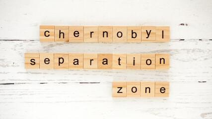 separation zone.words from wooden cubes with letters photo