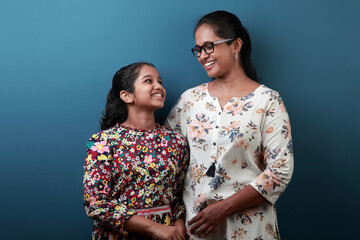 Happy mother and daughter of Indian ethnicity 