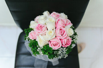 A beautiful champagne and pink rose bouquet