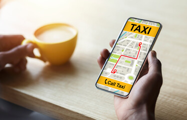 Young woman holding smartphone with taxi app interface