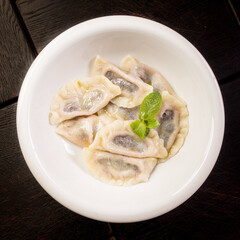 hand-made boiled dumplings with cherries