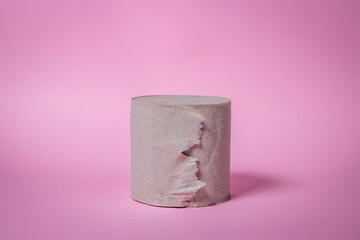 Toilet paper on a pink background. Personal hygiene. Paper product.